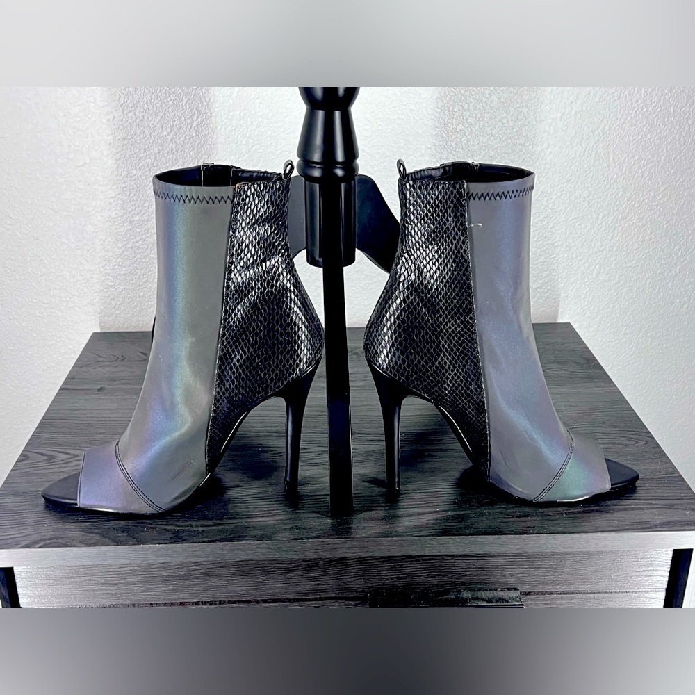 Fun, grey (grey changes color in different lighting) 4 1/2” heeled, mid-calf